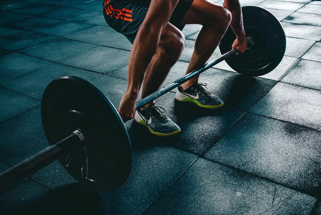 self-care for men: lifting weights